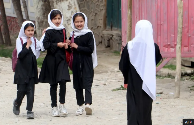 Young Afghan girls going to school, Credit AFP