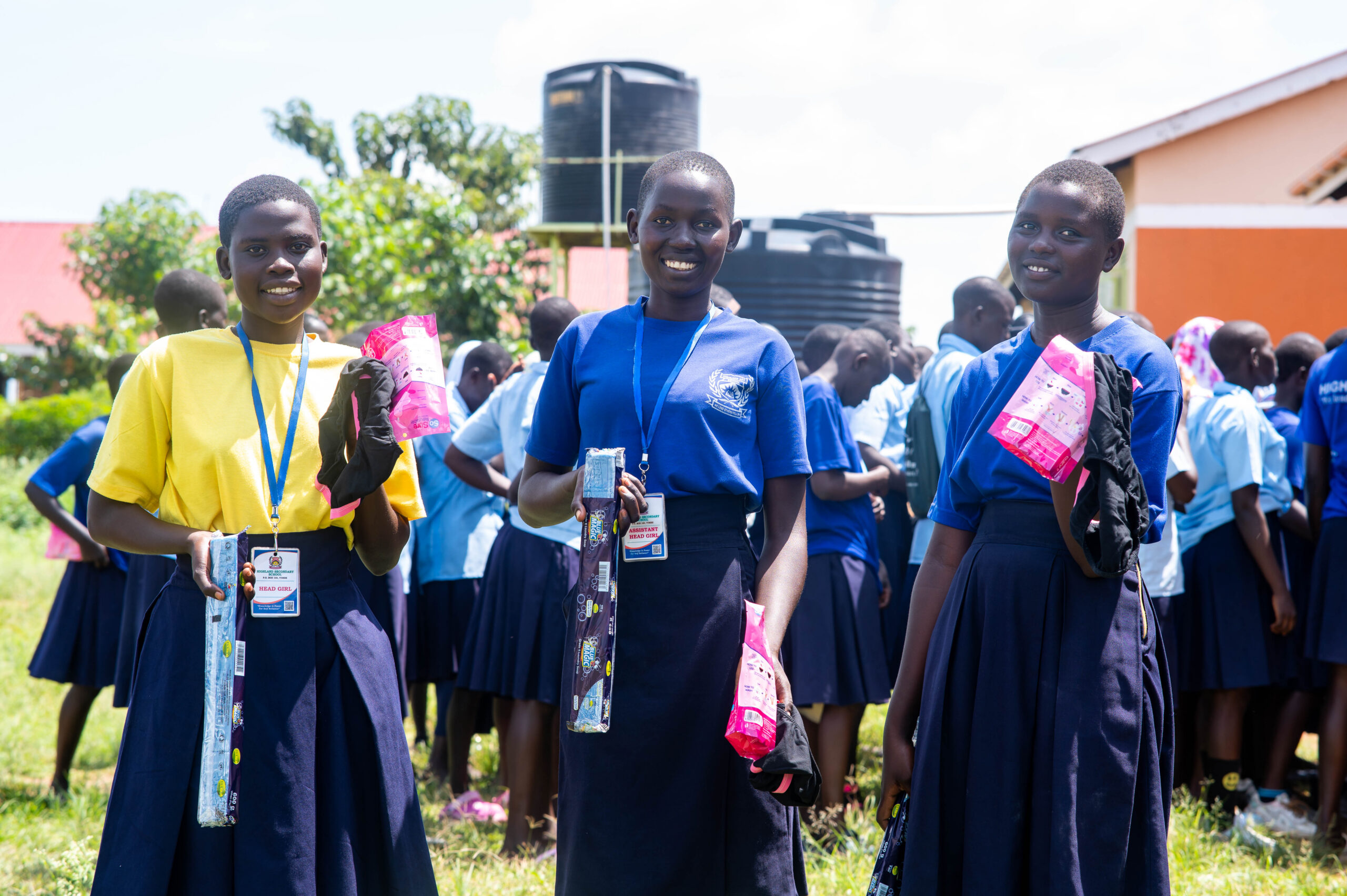 Girls in Uganda GFS program receiving sanitary pads and soap