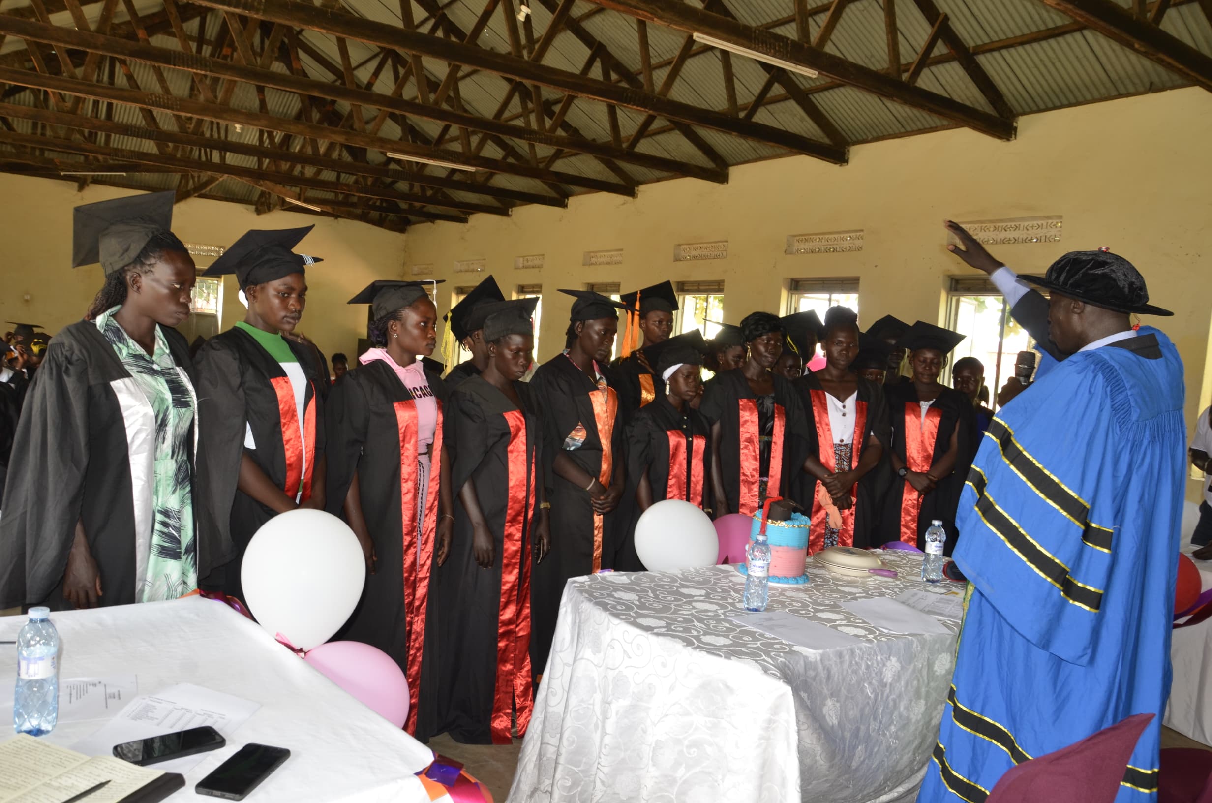 Students in Uganda graduate after catching up with War Child's BRIDGE program.